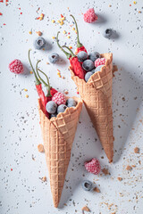 Spicy ice cream with chilli and fruits. Strange icecream.