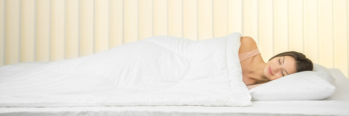 The happy woman lay on the bed