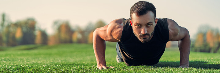 The man pushing up on the grass