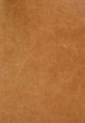 Genuine brown leather texture background.
