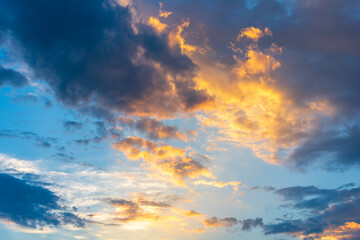 Naklejka na ściany i meble Dramatic sunset sky with beautiful color sun light and cloudy sky.
