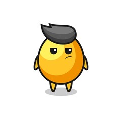 cute golden egg character with suspicious expression