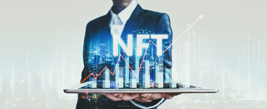 Business man with tablet and NFT crypto currency on network city technology background