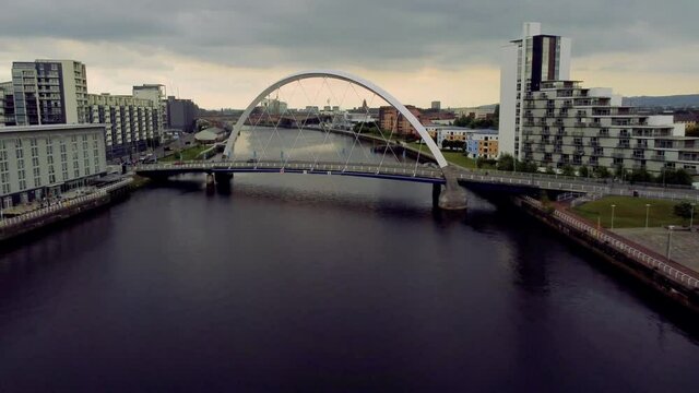 Glasgow Scotland 2021 4k aerial shot of squinty bridge and finnieston crane passing over river clyde