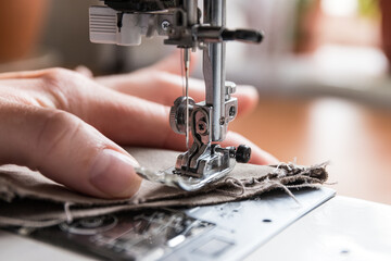 Production line sewing machine. Needle and footstep detail