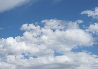 Naklejka na ściany i meble dramatic blue sky with clouds background