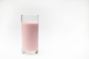 A glass of strawberry milk on isolated white background.