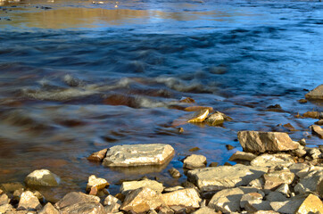 River runs their waters to its place on earth