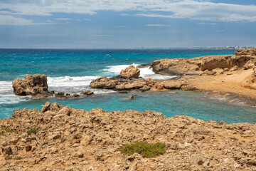 Fototapeta na wymiar Ayia Napa rocky stormy seafront, Cyprus.