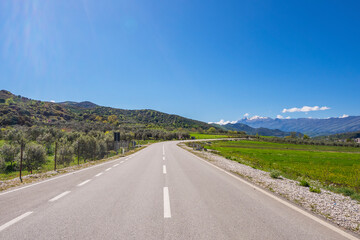 Curved asphalt road in high mountains of Albania