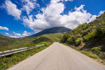 Curved asphalt road in high mountains of Albania
