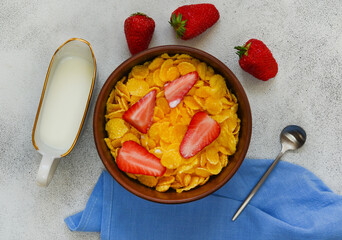healthy breakfast and snack, cornflakes with strawberry fruit, summer healthy food and sweet dessert, fitness nutrition