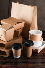 Eco craft paper tableware. Paper cups, dishes, bag, fast food containers, box for delivery food on...