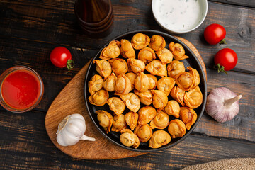Oriental Fried Dumplings with Minced Meat also known as Gyoza, Dim Sum, Jiaozi, Momo, Tortellini.