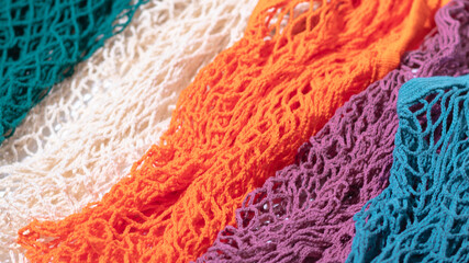 The banner of multi-colored string shoppers pattern was shot in macro style. Bright colors for your eco-friendly design.