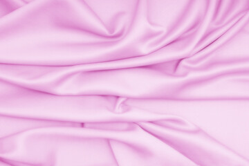 Smooth pink cloth, silk, fabric, satin texture background.
