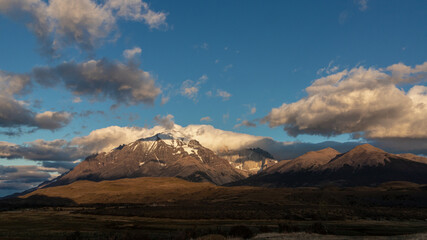Sunset in the Andes Mountains. Landscape with Morning Andes, Chile. Top of the Mount Torres del...