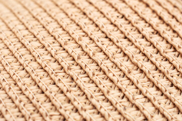 Texture of female straw hat. Close up.