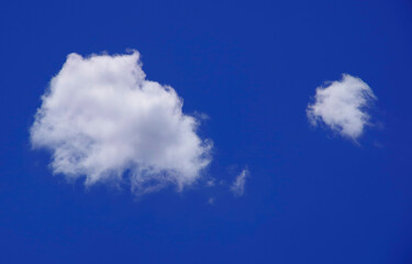 Two white clouds. Small and large.
