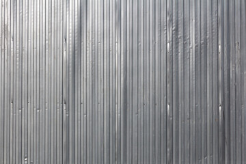 Corrugated striped metal wall surface for advertising, industrial background or texture.