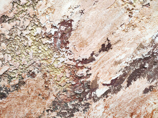 Texture of beige and red stone decorative plaster or concrete wall