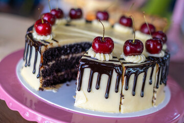 Chocolate cheese cake with cherry on top