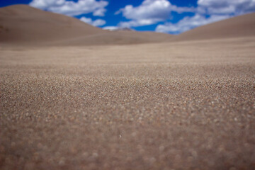Fototapeta na wymiar desert sand and clouds