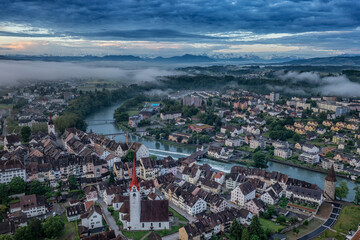 Obraz premium aerial view of a medieval town and the alps 