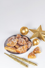 Fried sweet (borrachuelo) stuffed with angel hair, a typical Spanish dessert from Andalusia. Ideal for Christmas and Easter. Vertical shot and selective focus.