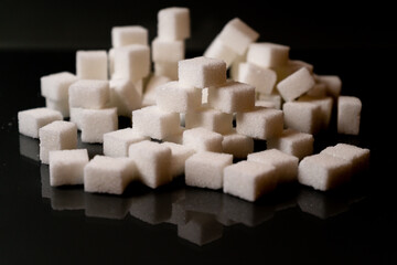 Sugar cubes in different arrangements and colored light. Bavaria Germany . Arrow, Pile, Cube, Square,