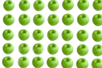 Top view of green apples on a white background, summer fruits concept idea photo.