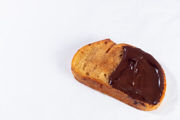 Fried bread with milk, egg, sugar, cinnamon and chocolate (Torrijas). Typical Spanish Easter sweet. Horizontal photography and selective focus