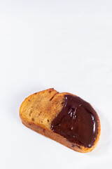 Fried bread with milk, egg, sugar, cinnamon and chocolate (Torrijas). Typical Spanish Easter sweet. Vertical photography and selective focus
