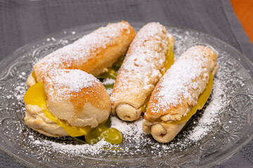 (Carmelitas de Jerez) Typical Andalusian dessert of dough bread and cream special for Christmas and Easter. Traditional home cooking concept. Horizontal photo and selective focus