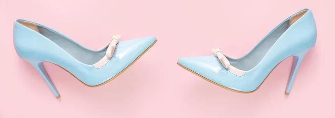 Fotobehang Pare of  blue shiny high heel shoes on pink background, flat lay, banner © 18042011