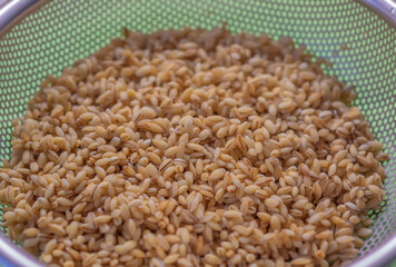 Pearl barley, washed with warm water before cooking
