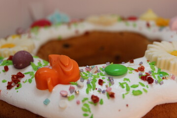 Yummy cake with icing and sprinkles. Spring cake. Easter cake.