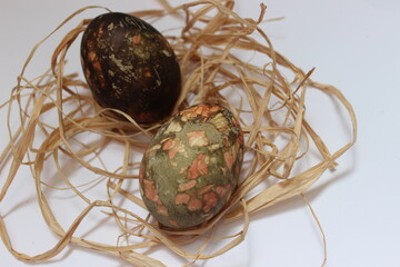 Amazing color eggs in Easter. Nest with eggs. Easter symbol.