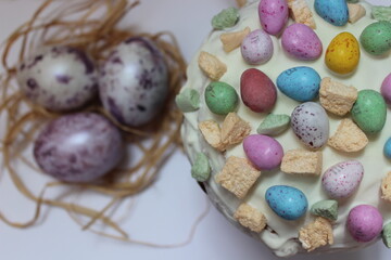 Decoration easter cake with easter eggs on white background. Easter day. Yummy celebration. Gourmet cake.