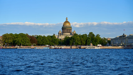 Fototapeta na wymiar Cityscape with St. Isaac's Cathedral and the Neva River in St. Petersburg in Russia.