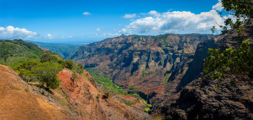 Waimea Canyon, Kauai, Hawaii. Waimea Canyon, on Kauai's West Side, is described as “The Grand Canyon of the Pacific.” The canyon is 14 miles long, 1 mile wide and more than 3,600 feet deep. 