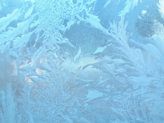Frosty patterns on windows in winter.