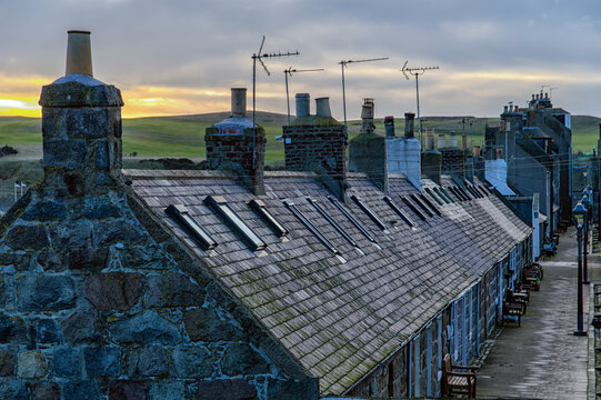 Row of historic cottages at Footdee in Aberdeen, Scotland, UK -