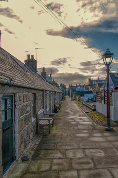 Row of historic cottages at Footdee in Aberdeen, Scotland, UK -