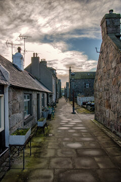 Row of historic cottages at Footdee in Aberdeen, Scotland, UK -