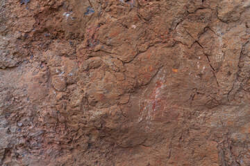 Brick red stone texture closeup background