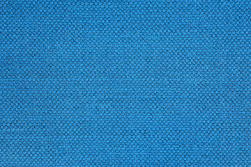 Blue fabric background and texture with copy space, view from above
