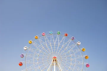 Fotobehang ferris wheel on a blue sky © AntonioLuigi