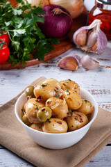 Homemade mini pickled potatoes in a white bowl