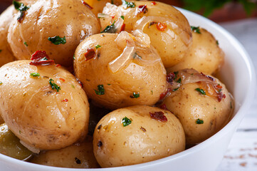 Homemade mini pickled potatoes in a white bowl